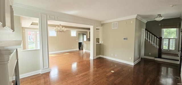1648 S Ira St, Bloomington, IN 47401 - unfurnished living room featuring stairs, plenty of natural light, wood finished floors, and crown molding