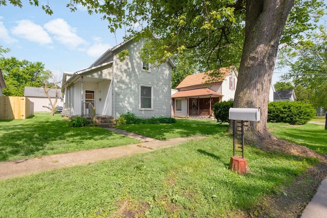 605 N 7th St, Goshen, IN 46528 - view of front of house featuring a front lawn