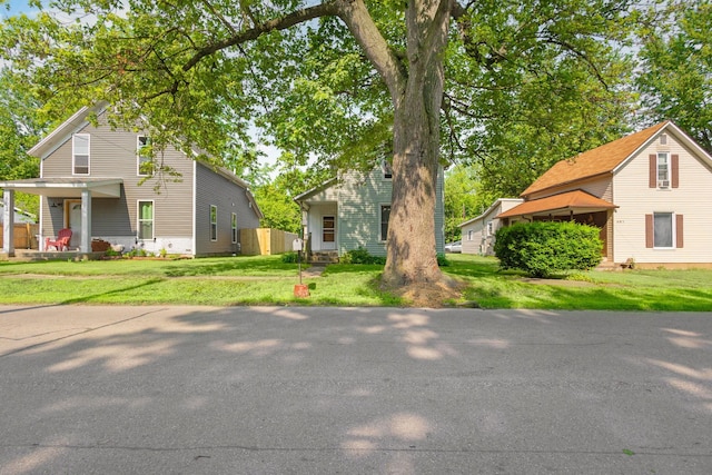 605 N 7th St, Goshen, IN 46528 - view of front facade with a front lawn