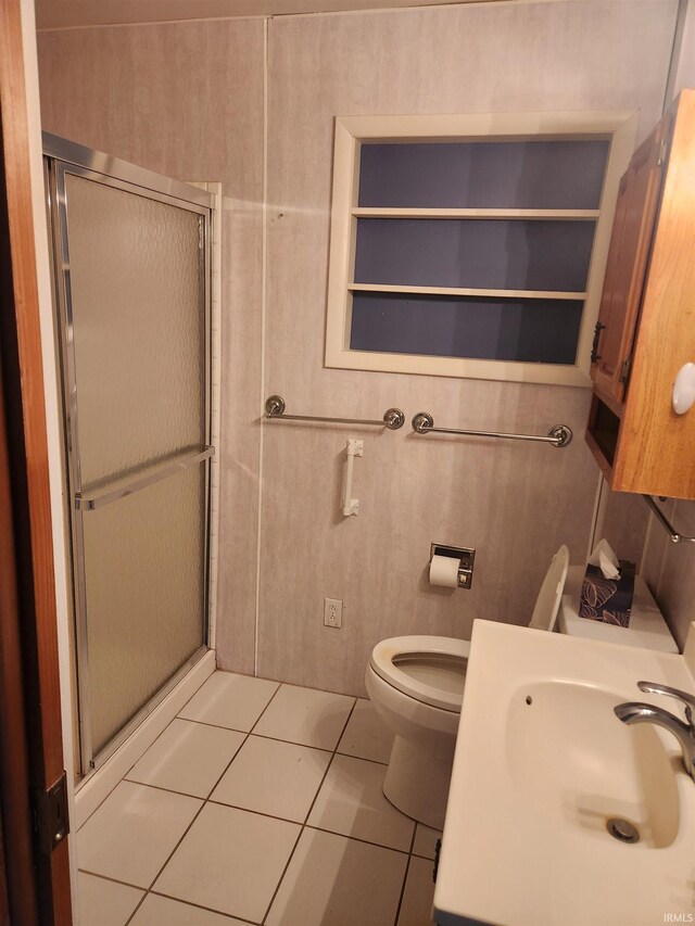 6480 E Mcguire Rd, Churubusco, IN 46723 - bathroom featuring a stall shower, tile patterned flooring, and vanity