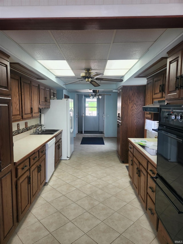 6480 E Mcguire Rd, Churubusco, IN 46723 - kitchen with dishwasher, oven, a warming drawer, a ceiling fan, and light countertops