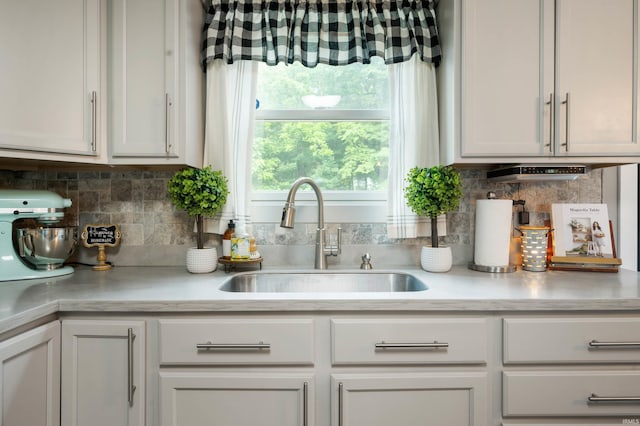 15880 N County Road 300 W, Gaston, IN 47342 - kitchen with light countertops, decorative backsplash, and white cabinets