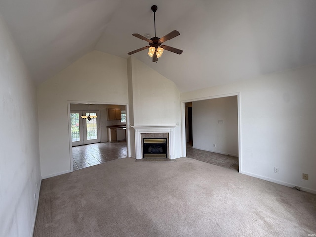 8433 Countrywood Ct, Newburgh, IN 47630 - unfurnished living room featuring a chandelier, light carpet, high vaulted ceiling, a ceiling fan, and a tile fireplace