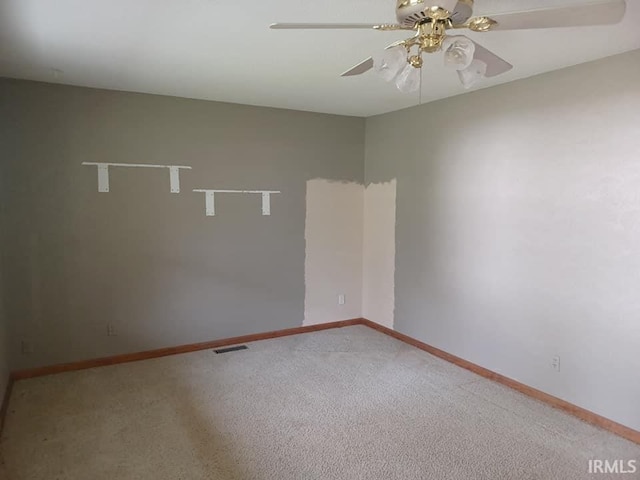1612 Meadow St, Carmi, IL 62821 - empty room featuring ceiling fan and light carpet