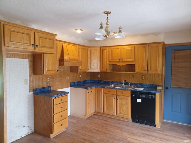 1612 Meadow St, Carmi, IL 62821 - kitchen featuring black dishwasher, a chandelier, light wood-style floors, pendant lighting, and dark countertops