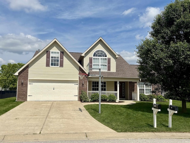 222 Sinclair Dr, West Lafayette, IN 47906 - traditional-style home with driveway, brick siding, a front lawn, covered porch, and an attached garage