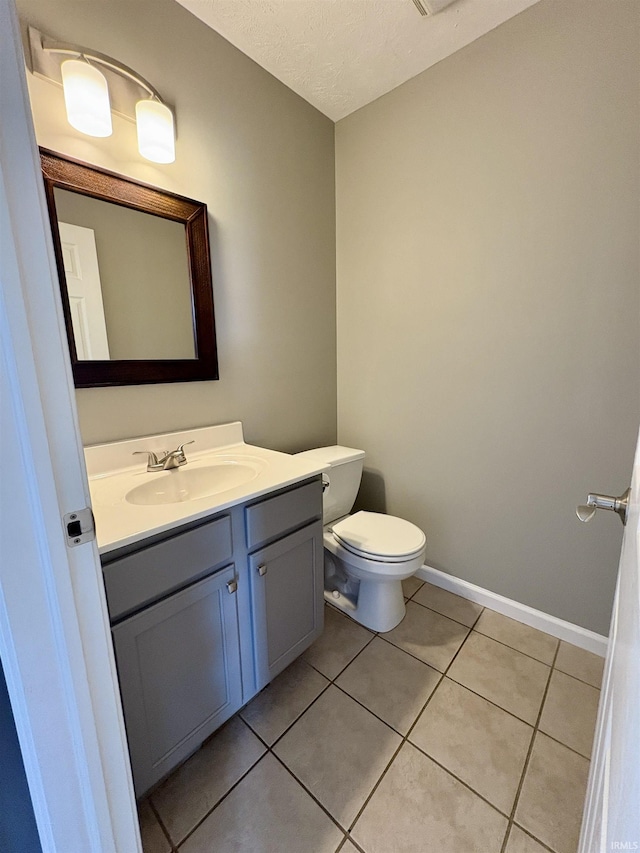 222 Sinclair Dr, West Lafayette, IN 47906 - bathroom featuring vanity, tile patterned flooring, and a textured ceiling