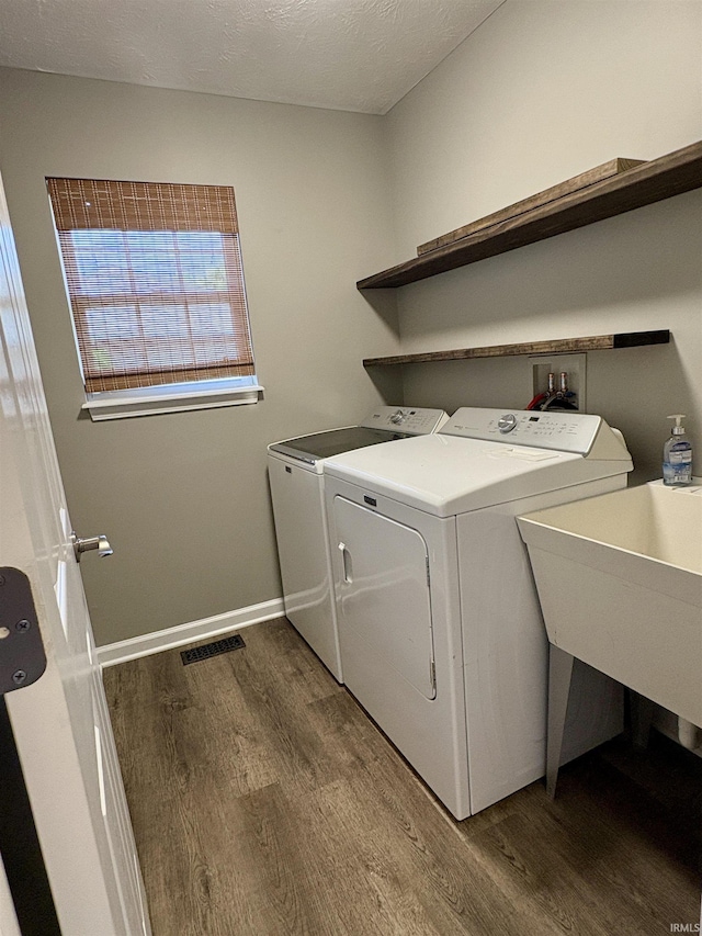 222 Sinclair Dr, West Lafayette, IN 47906 - laundry room with washer and clothes dryer and wood finished floors