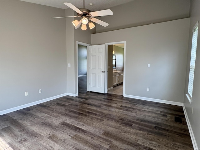 222 Sinclair Dr, West Lafayette, IN 47906 - empty room with ceiling fan, dark wood finished floors, healthy amount of natural light, and lofted ceiling