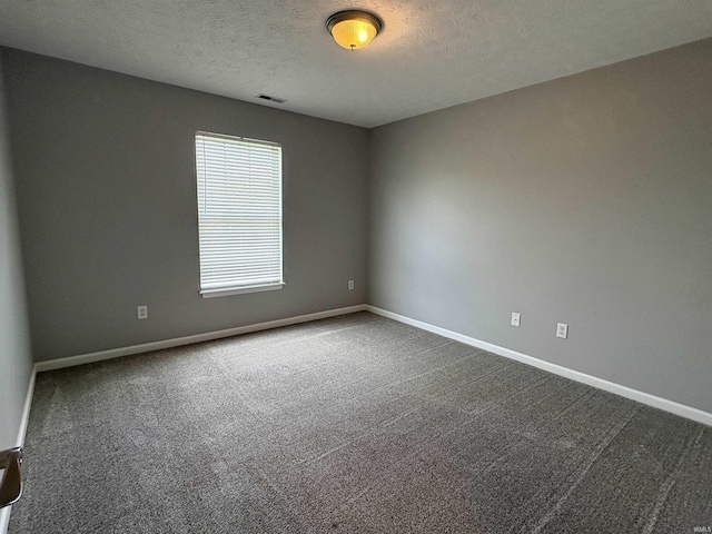 222 Sinclair Dr, West Lafayette, IN 47906 - carpeted empty room featuring baseboards and a textured ceiling
