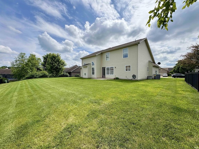 222 Sinclair Dr, West Lafayette, IN 47906 - rear view of house featuring a lawn