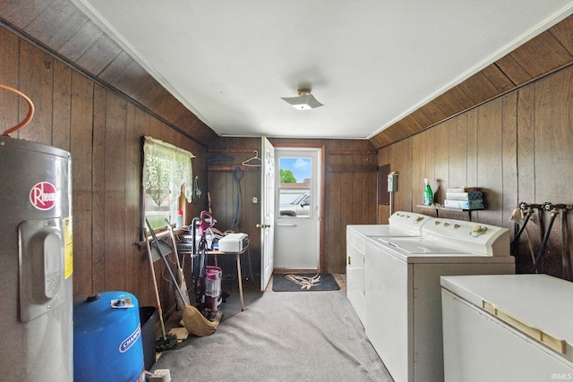 512 E Pike St, Kirklin, IN 46050 - washroom featuring water heater, independent washer and dryer, wooden walls, and light colored carpet