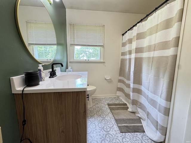 1635 Liberty St, Covington, IN 47932 - full bath featuring vanity, healthy amount of natural light, and a shower with shower curtain