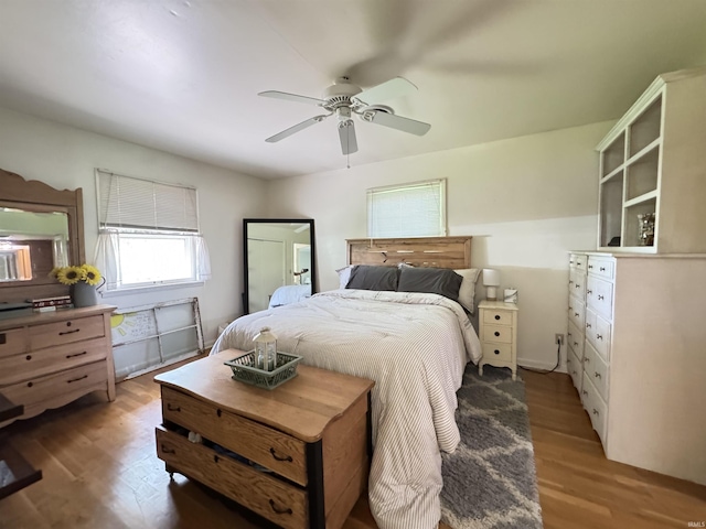 1635 Liberty St, Covington, IN 47932 - bedroom featuring wood finished floors and a ceiling fan