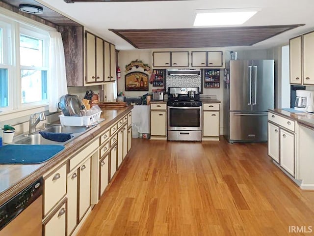 485 Boone St, New Haven, IL 62867 - kitchen with stainless steel appliances, ventilation hood, and light wood finished floors