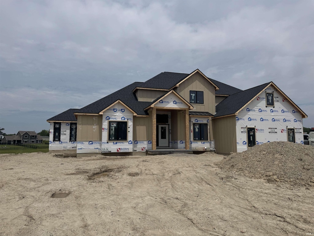 17727 Castlefeane Ct, Leo, IN 46765 - property in mid-construction featuring board and batten siding, a standing seam roof, and roof with shingles