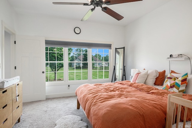 645 E Essex Dr, Warsaw, IN 46582 - bedroom featuring light colored carpet and a ceiling fan