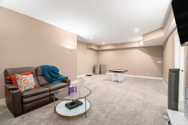 645 E Essex Dr, Warsaw, IN 46582 - living area with carpet floors, a heating unit, and recessed lighting