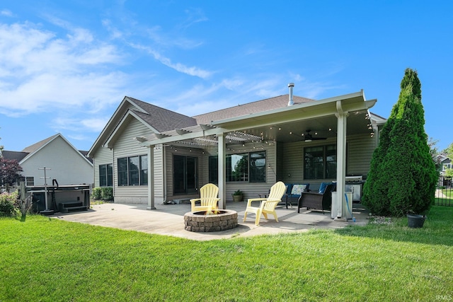 645 E Essex Dr, Warsaw, IN 46582 - back of house with an outdoor fire pit, a patio, a ceiling fan, and roof with shingles