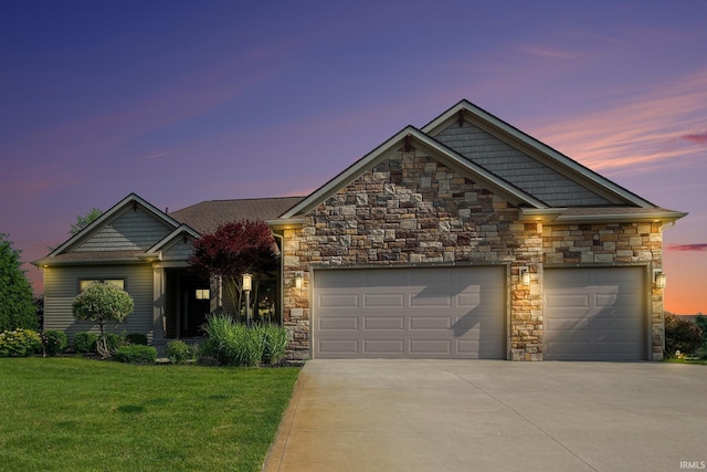 645 E Essex Dr, Warsaw, IN 46582 - craftsman inspired home featuring stone siding, concrete driveway, an attached garage, and a front lawn