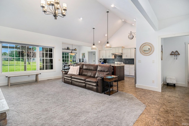 645 E Essex Dr, Warsaw, IN 46582 - living area featuring high vaulted ceiling and a chandelier