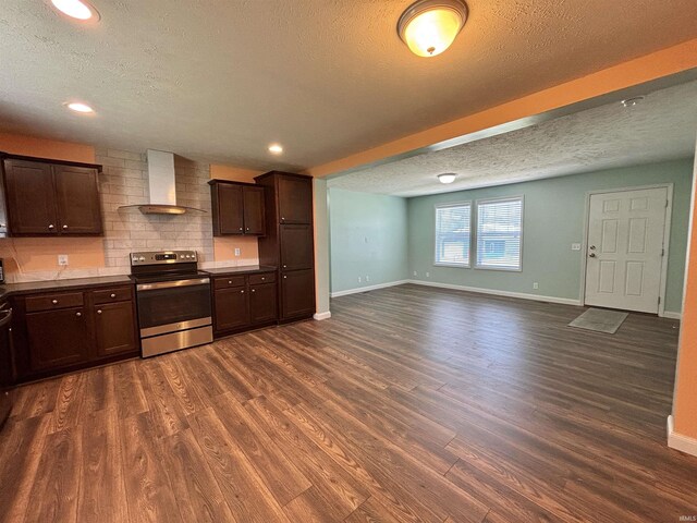 215 N Jefferson St, Lyons, IN 47443 - kitchen featuring wall chimney exhaust hood, stainless steel range with electric cooktop, a textured ceiling, dark wood finished floors, and dark brown cabinets