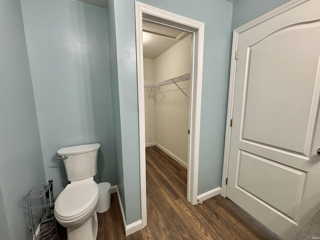 215 N Jefferson St, Lyons, IN 47443 - bathroom with wood finished floors and a walk in closet