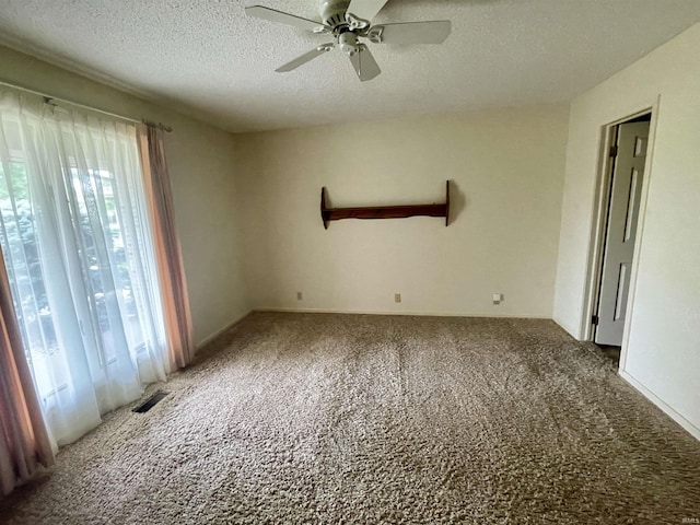 845 Crosspointe Ct, Wabash, IN 46992 - carpeted empty room with ceiling fan and a textured ceiling
