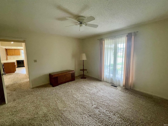 845 Crosspointe Ct, Wabash, IN 46992 - empty room with ceiling fan, light carpet, and a textured ceiling