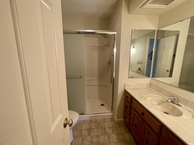 845 Crosspointe Ct, Wabash, IN 46992 - bathroom featuring a stall shower, vanity, a textured ceiling, and tile patterned flooring