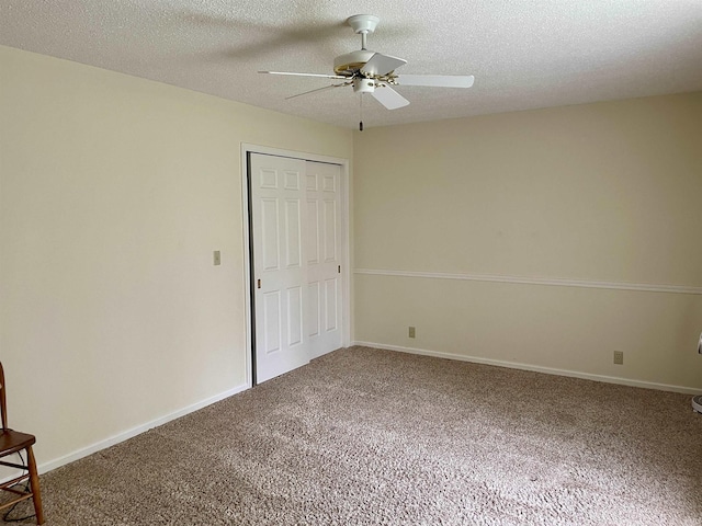 845 Crosspointe Ct, Wabash, IN 46992 - unfurnished bedroom featuring carpet floors, ceiling fan, a textured ceiling, and a closet