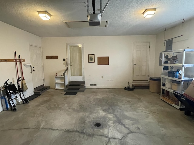 845 Crosspointe Ct, Wabash, IN 46992 - garage featuring a garage door opener and baseboards