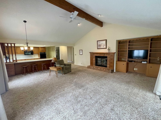 845 Crosspointe Ct, Wabash, IN 46992 - living room featuring a fireplace, light carpet, a ceiling fan, and a chandelier