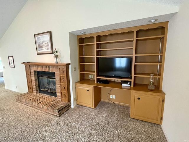 845 Crosspointe Ct, Wabash, IN 46992 - unfurnished living room featuring carpet flooring, lofted ceiling, and a brick fireplace
