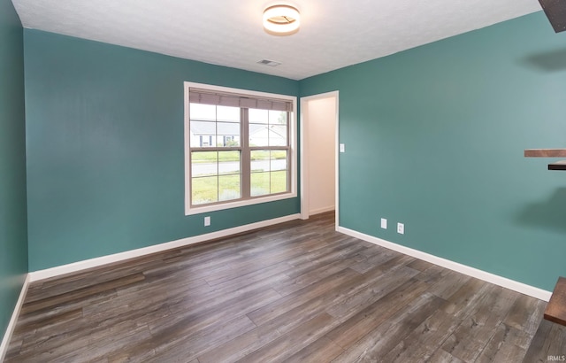 390 Mallard Cir, Chandler, IN 47610 - spare room with wood finished floors