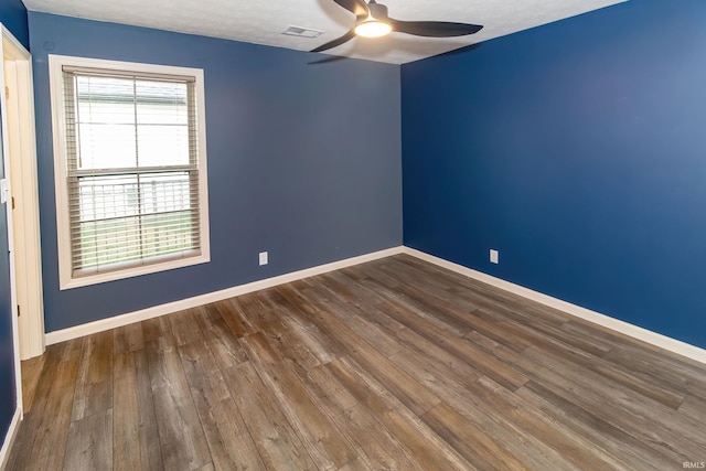 390 Mallard Cir, Chandler, IN 47610 - unfurnished room with ceiling fan and wood finished floors