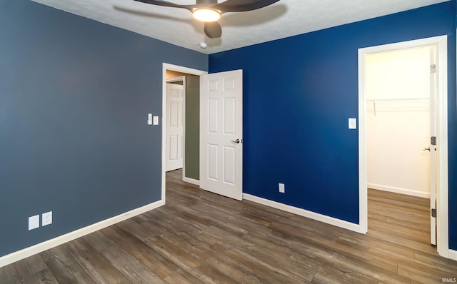 390 Mallard Cir, Chandler, IN 47610 - spare room with wood finished floors and a ceiling fan