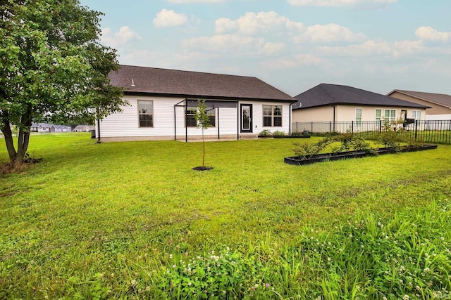 390 Mallard Cir, Chandler, IN 47610 - back of house with a vegetable garden