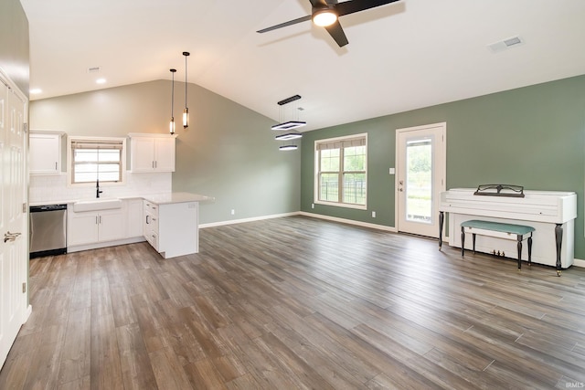 390 Mallard Cir, Chandler, IN 47610 - unfurnished living room with ceiling fan, lofted ceiling, and wood finished floors