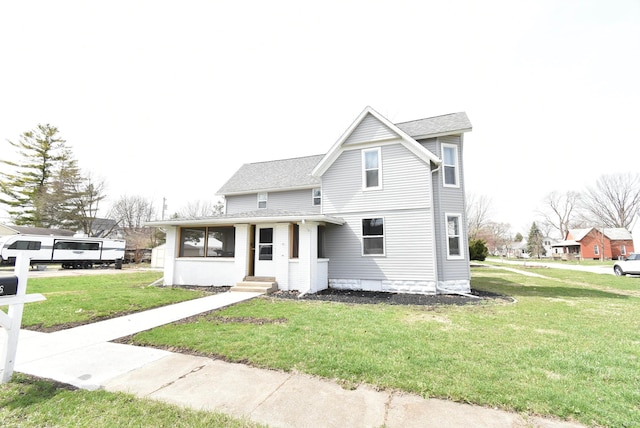 206 N Van Buren Ave, Fowler, IN 47944 - view of front of house with a front yard and a shingled roof
