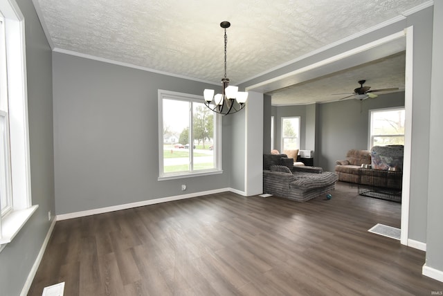 206 N Van Buren Ave, Fowler, IN 47944 - dining space featuring dark wood-type flooring, a chandelier, a textured ceiling, and ceiling fan