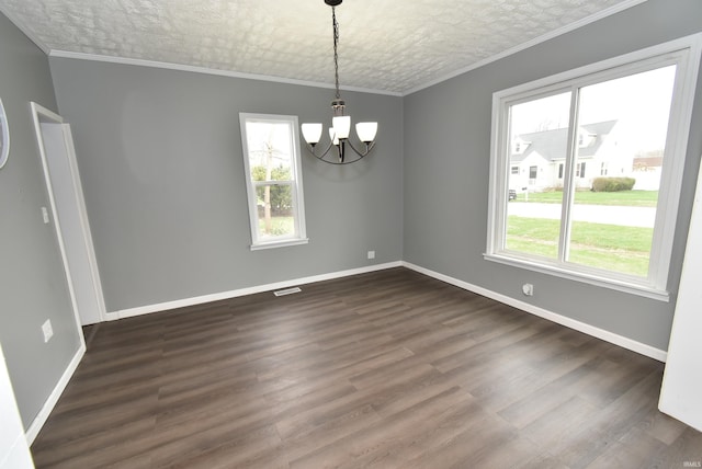 206 N Van Buren Ave, Fowler, IN 47944 - spare room featuring a chandelier, dark wood-type flooring, and an ornate ceiling