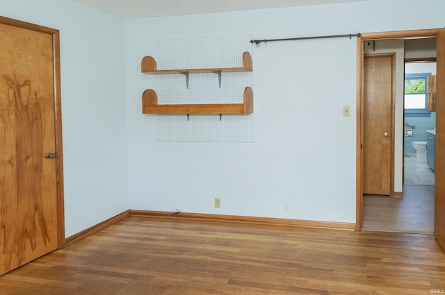 2330 N Fritz Dr, Bloomington, IN 47408 - unfurnished room featuring wood finished floors