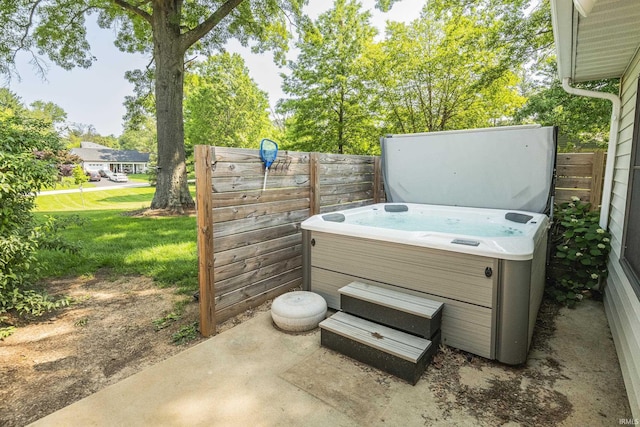 2330 N Fritz Dr, Bloomington, IN 47408 - view of patio featuring a hot tub