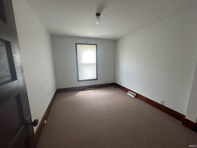 237 Stanley St, Mishawaka, IN 46545 - spare room featuring carpet floors