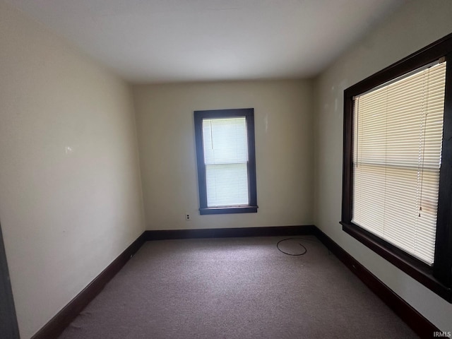 237 Stanley St, Mishawaka, IN 46545 - carpeted empty room featuring baseboards