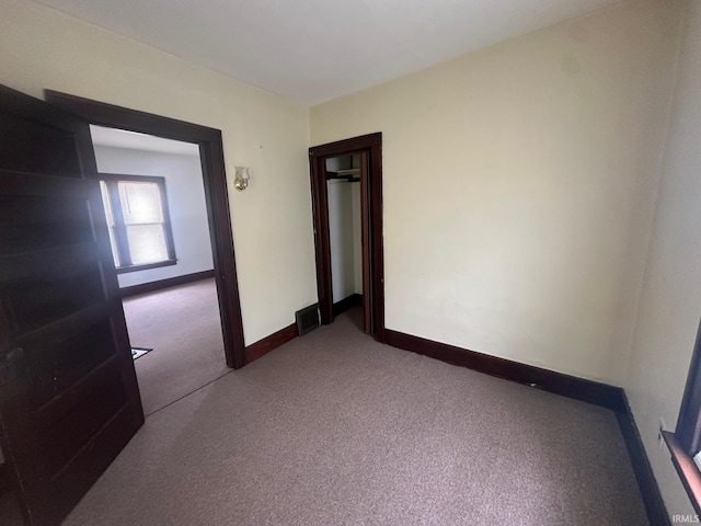 237 Stanley St, Mishawaka, IN 46545 - carpeted empty room featuring baseboards