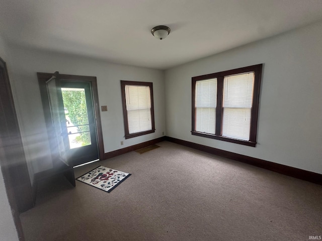 237 Stanley St, Mishawaka, IN 46545 - spare room featuring carpet flooring and baseboards