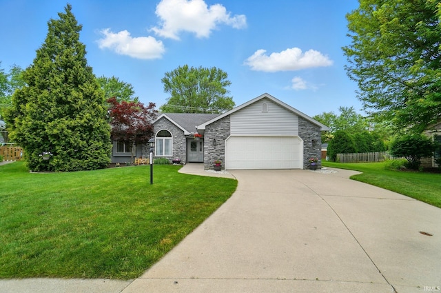 1322 Canal Ridge Dr, New Haven, IN 46774 - view of front facade featuring an attached garage, stone siding, and driveway