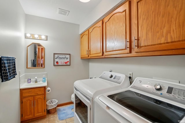 1322 Canal Ridge Dr, New Haven, IN 46774 - laundry room with independent washer and dryer and light tile patterned floors